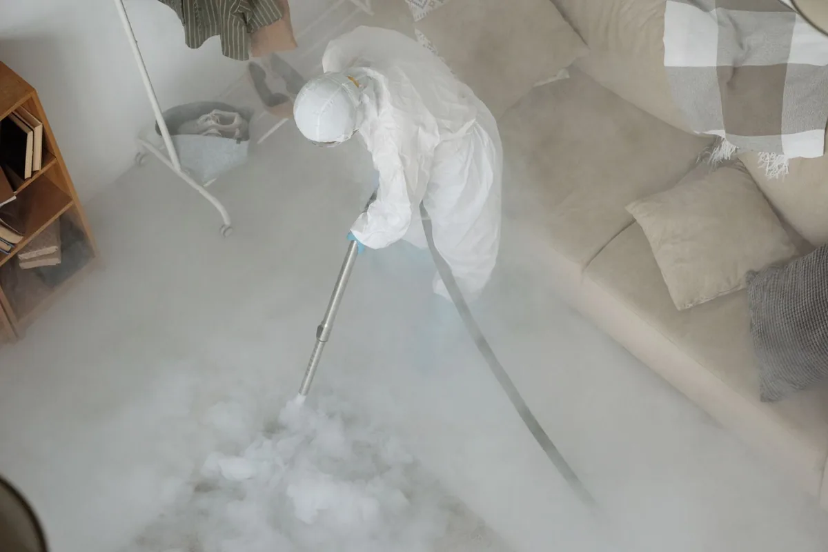 Biohazard cleanup technician in protective equipment, Ortega Farms, Jacksonville, FL